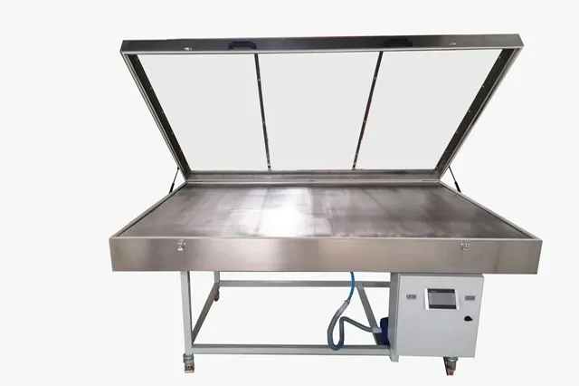 HEATED VACUUM TABLE